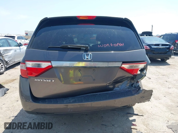 2012 Honda Odyssey EX with VIN 5FNRL5H41CB011940, listed as a IAAI auction lot 42033966 with 182,996 mi miles and . Bid and sale history available at DreamBid. Image 16.