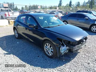 2015 Mazda 3 i Grand Touring with VIN JM1BM1M7XF1240086, listed as a IAAI auction lot 42663284 with 159,599 mi miles and . Bid and sale history available at DreamBid. Image 1.