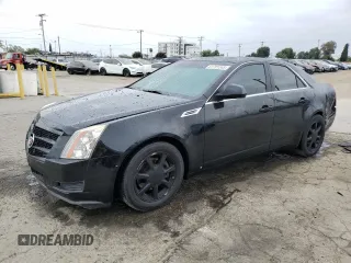 2009 Cadillac CTS RWD z VIN 1G6DF577X90148673, wystawiony jako Copart lot #61781245 z przebiegiem 118 874 mil mil oraz Szkoda całkowita • Salvage title. Historia ofert i sprzedaży dostępna na DreamBid. Obrazek 1.