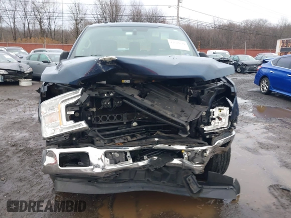 2019 Ford F-150 XL with VIN 1FTEW1EB3KFB10433, listed as a IAAI auction lot 41520139 with 104,405 mi miles and . Bid and sale history available at DreamBid. Image 12.