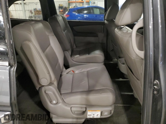 2012 Honda Odyssey Touring with VIN 5FNRL5H98CB028309, listed as a Copart auction lot 57663485 with 233,921 mi miles and Salvage title. Bid and sale history available at DreamBid. Image 11.