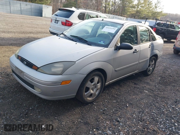 2004 Ford Focus ZTS with VIN 1FAFP38Z74W154059, listed as a IAAI auction lot 41695294 with 146,270 mi miles and . Bid and sale history available at carsss.com. Image 2.