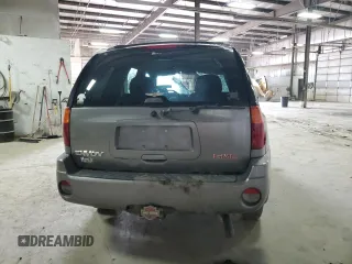 2005 GMC Envoy SLT z VIN 1GKDT13S652287033, wystawiony jako Copart lot #52508925 z przebiegiem 170 434 mil mil oraz Szkoda całkowita • Salvage title. Historia ofert i sprzedaży dostępna na DreamBid. Obrazek 6.
