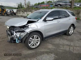 2019 Chevrolet Equinox Premier z VIN 3GNAXYEX3KS673209, wystawiony jako Copart lot #56182005 z przebiegiem 65 497 mil mil oraz Szkoda całkowita • Salvage title. Historia ofert i sprzedaży dostępna na DreamBid. Obrazek 1.