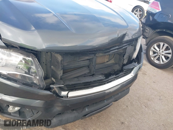 2016 Chevrolet Colorado 2WD LT z VIN 1GCGSCE37G1374901, wystawiony jako IAAI lot #41463562 z przebiegiem 163 716 mil mil oraz . Historia ofert i sprzedaży dostępna na DreamBid. Obrazek 17.