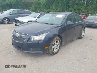 2014 Chevrolet Cruze 1LT with VIN 1G1PC5SB0E7137724, listed as a IAAI auction lot 42175995 with 276,145 mi miles and . Bid and sale history available at DreamBid. Image 2.