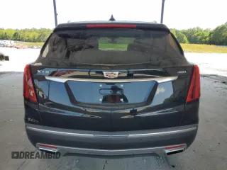 2021 Cadillac XT5 FWD Premium Luxury с VIN 1GYKNCRSXMZ155473, выставлен на аукционе Copart как лот 59883874 с пробегом 2 038 миль миль и Списание • Salvage title. История ставок и продаж доступна на DreamBid. Изображение 6.