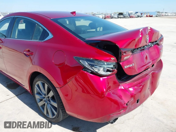 2020 Mazda 6 Grand Touring with VIN JM1GL1TY7L1511054, listed as a IAAI auction lot 41734848 with 70,573 mi miles and . Bid and sale history available at carsss.com. Image 6.