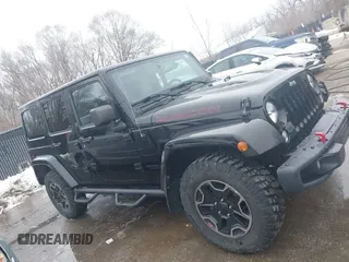 2015 Jeep Wrangler Unlimited Rubicon Hard Rock with VIN 1C4HJWFG9FL569962, listed as a IAAI auction lot 41557801 with 78,597 mi miles and . Bid and sale history available at DreamBid. Image 13.