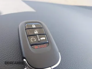 2025 Honda Civic Sport with VIN 2HGFE2F50SH514604, listed as a IAAI auction lot 41585374 with 2,064 mi miles and . Bid and sale history available at DreamBid. Image 11.