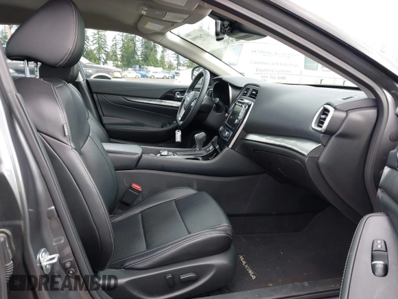 2023 Nissan Maxima SV with VIN 1N4AA6CV4PC512497, listed as a IAAI auction lot 41760990 with 32,400 mi miles and . Bid and sale history available at DreamBid. Image 5.