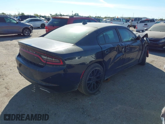 2018 Dodge Charger SXT Plus with VIN 2C3CDXHG0JH234684, listed as a IAAI auction lot 40981415 with Not Provided miles and . Bid and sale history available at DreamBid. Image 4.