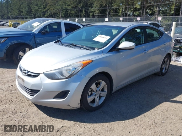 2013 Hyundai Elantra GLS z VIN 5NPDH4AE4DH333340, wystawiony jako IAAI lot #42068261 z przebiegiem 122 863 mil mil oraz . Historia ofert i sprzedaży dostępna na DreamBid. Obrazek 2.
