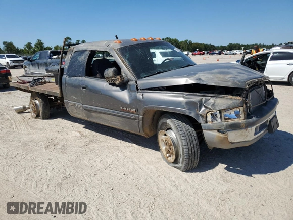 2002 Dodge Ram 2500 with VIN 3B7KC23C52M271394, listed as a Copart auction lot 73596554 with 0 mi miles and Salvage Title. Bid and sale history available at carsss.com. Image 4.