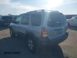 2003 Mazda Tribute LX with VIN 4F2YZ04183KM44733, listed as a IAAI auction lot 41472662 with 246,522 mi miles and . Bid and sale history available at DreamBid. Image 3.