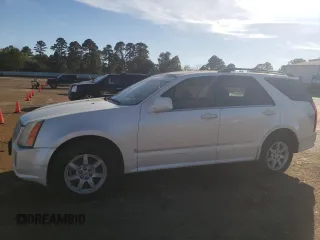 2009 Cadillac SRX RWD z VIN 1GYEE637X90104201, wystawiony jako Copart lot #80286134 z przebiegiem 146 605 mil mil oraz Czysty tytuł • Clean title. Historia ofert i sprzedaży dostępna na DreamBid. Obrazek 1.