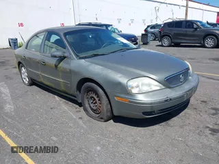 2002 Mercury Sable GS z VIN 1MEFM50U22G639052, wystawiony jako IAAI lot #42809441 z przebiegiem 151 369 mil mil oraz . Historia ofert i sprzedaży dostępna na DreamBid. Obrazek 1.