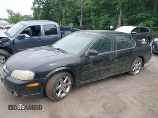 2003 Nissan Maxima GLE z VIN JN1DA31A93T413922, wystawiony jako IAAI lot #42360687 z przebiegiem Nie podano mil oraz . Historia ofert i sprzedaży dostępna na DreamBid. Obrazek 2.