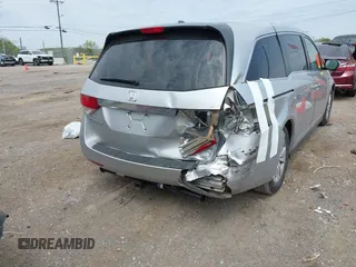 2014 Honda Odyssey EX-L with VIN 5FNRL5H60EB115792, listed as a IAAI auction lot 42064607 with 191,055 mi miles and . Bid and sale history available at carsss.com. Image 4.