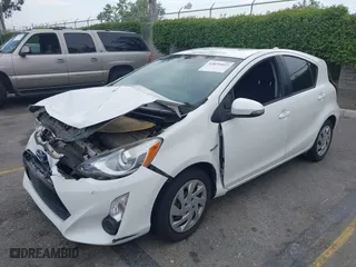 2015 Toyota Prius c One with VIN JTDKDTB3XF1097538, listed as a IAAI auction lot 42031057 with 100,847 mi miles. Bid and sale history available at carsss.com. Image 17.