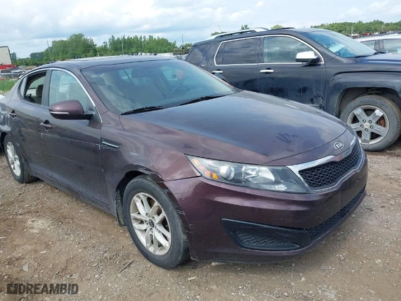 2011 Kia Optima LX with VIN KNAGM4A73B5063778, listed as a IAAI auction lot 39932051 with 143,175 mi miles. Bid and sale history available at carsss.com. Image 1.