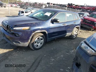 2015 Jeep Cherokee Sport with VIN 1C4PJLAB2FW547371, listed as a IAAI auction lot 41588682 with 135,640 mi miles. Bid and sale history available at carsss.com. Image 2.