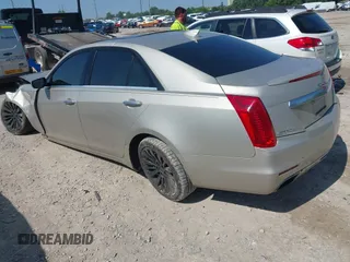 2015 Cadillac CTS Luxury AWD with VIN 1G6AX5SX7F0133440, listed as a IAAI auction lot 42560857 with 82,910 mi miles and . Bid and sale history available at DreamBid. Image 3.