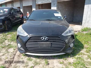 2013 Hyundai Veloster Turbo z VIN KMHTC6AE7DU124293, wystawiony jako IAAI lot #41924836 z przebiegiem 141 685 mil mil oraz . Historia ofert i sprzedaży dostępna na DreamBid. Obrazek 6.