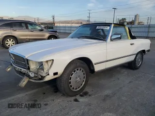 1989 Mercedes-Benz 560 Series 560SL with VIN WDBBA48D7KA100290, listed as a Copart auction lot 85049924 with 88,919 mi miles and Salvage Title. Bid and sale history available at carsss.com. Image 1.
