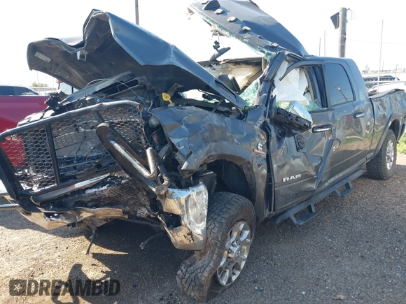 2020 Ram 2500 Laramie z VIN 3C6UR5NLXLG314141, wystawiony jako IAAI lot #42263978 z przebiegiem Nie podano mil oraz . Historia ofert i sprzedaży dostępna na DreamBid. Obrazek 2.