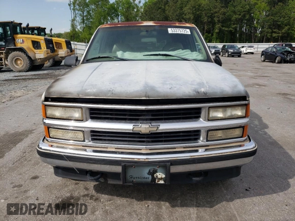 1998 Chevrolet Tahoe z VIN 1GNEK13R7WJ348565, wystawiony jako Copart lot #53375725 z przebiegiem 176 919 mil mil oraz Szkoda całkowita • Salvage title. Historia ofert i sprzedaży dostępna na DreamBid. Obrazek 5.