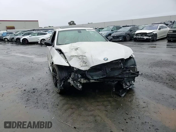 2012 BMW 3 Series 335is with VIN WBAKG1C50CJ217108, listed as a Copart auction lot 56609175 with 105,899 mi miles and Salvage title. Bid and sale history available at DreamBid. Image 14.