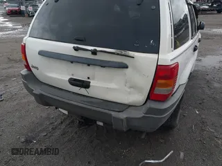 2000 Jeep Grand Cherokee Laredo z VIN 1J4G248S2YC339997, wystawiony jako IAAI lot #42395079 z przebiegiem 261 704 mil mil oraz . Historia ofert i sprzedaży dostępna na DreamBid. Obrazek 6.