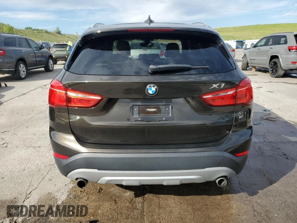 2017 BMW X1 xDrive28i with VIN WBXHT3C32H5F71690, listed as a Copart auction lot 60852375 with 67,475 mi miles and Salvage title. Bid and sale history available at DreamBid. Image 6.