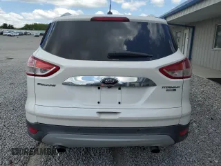2015 Ford Escape Titanium z VIN 1FMCU9J90FUC41606, wystawiony jako Copart lot #57458455 z przebiegiem 71 671 mil mil oraz Szkoda całkowita • Salvage title. Historia ofert i sprzedaży dostępna na DreamBid. Obrazek 6.