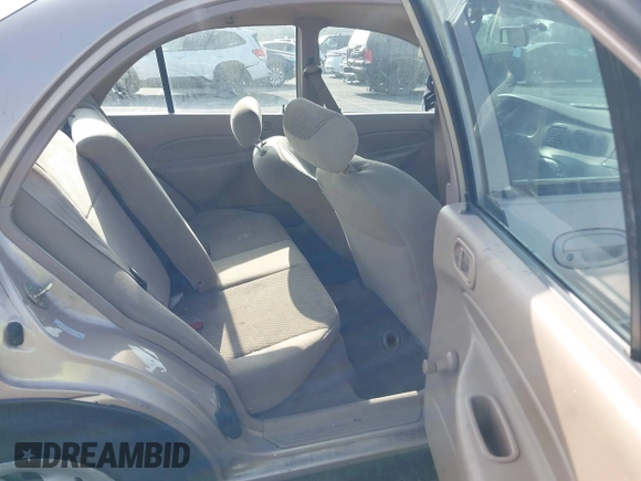 1999 Ford Escort LX with VIN 1FAFP10P3XW138847, listed as a IAAI auction lot 41216936 with 62,672 mi miles and . Bid and sale history available at DreamBid. Image 8.