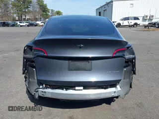 2023 Tesla Model Y Long Range with VIN 7SAYGDEE7PF856985, listed as a IAAI auction lot 42097675 with 13,112 mi miles and . Bid and sale history available at DreamBid. Image 17.