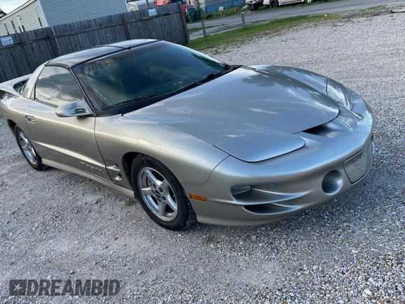 1999 Pontiac Firebird Formula with VIN 2G2FV22G1X2205745, listed as a Copart auction lot 65841425 with 142,913 mi miles and Clean title. Bid and sale history available at DreamBid. Image 1.