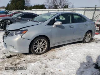 2010 Lexus HS 250h with VIN JTHBB1BAXA2009095, listed as a Copart auction lot 87185274 with 105,470 mi miles and Salvage Title. Bid and sale history available at DreamBid. Image 1.