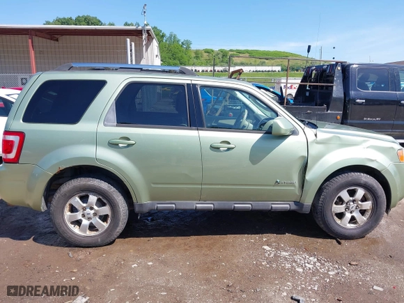 2009 Ford Escape Hybrid with VIN 1FMCU493X9KA56174, listed as a IAAI auction lot 39435925 with 158,171 mi miles. Bid and sale history available at carsss.com. Image 13.