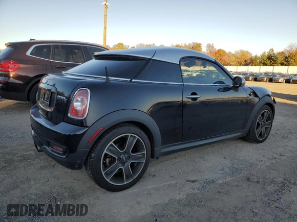 2013 MINI Coupe S z VIN WMWSX3C53DT466665, wystawiony jako Copart lot #79497824 z przebiegiem 94 767 mil mil oraz Szkoda całkowita • Salvage title. Historia ofert i sprzedaży dostępna na DreamBid. Obrazek 3.