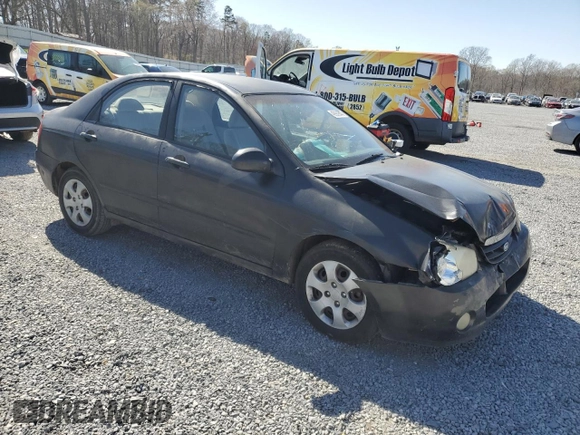 2004 Kia Spectra LX with VIN KNAFE121X45021922, listed as a Copart auction lot 49989845 with 184,189 mi miles and Salvage Title. Bid and sale history available at carsss.com. Image 4.