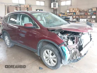 2014 Honda CR-V EX-L with VIN 5J6RM4H75EL103256, listed as a IAAI auction lot 42135385 with 104,465 mi miles. Bid and sale history available at carsss.com. Image 1.
