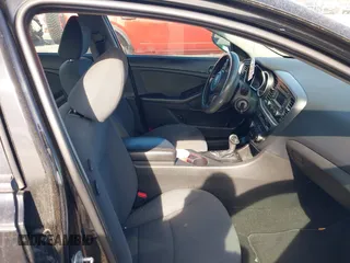 2015 Kia Optima LX with VIN KNAGM4A71F5630673, listed as a IAAI auction lot 42106584 with 245,005 mi miles and . Bid and sale history available at carsss.com. Image 5.