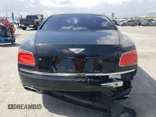 2014 Bentley Flying Spur z VIN SCBEC9ZA2EC095912, wystawiony jako Copart lot #51672955 z przebiegiem 42 555 mil mil oraz Szkoda całkowita • Salvage title. Historia ofert i sprzedaży dostępna na DreamBid. Obrazek 6.