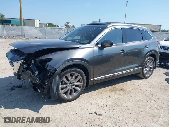 2020 Mazda CX-9 Grand Touring z VIN JM3TCADY8L0417775, wystawiony jako IAAI lot #42306864 z przebiegiem 35 287 mil mil oraz . Historia ofert i sprzedaży dostępna na DreamBid. Obrazek 18.