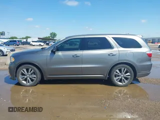 2013 Dodge Durango R/T z VIN 1C4SDHCT7DC564802, wystawiony jako IAAI lot #42348957 z przebiegiem 178 354 mil mil oraz . Historia ofert i sprzedaży dostępna na DreamBid. Obrazek 14.