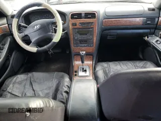 2004 Hyundai XG with VIN KMHFU45E24A326551, listed as a Copart auction lot 84244444 with 166,312 mi miles and Salvage Title. Bid and sale history available at carsss.com. Image 8.