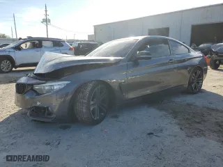 2015 BMW 4 Series 435i xDrive with VIN WBA3R5C56FK371987, listed as a Copart auction lot 88077015 with 0 mi miles and Salvage Title. Bid and sale history available at carsss.com. Image 1.