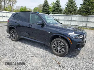 2023 BMW X5 xDrive45e z VIN 5UXTA6C01P9R61137, wystawiony jako Copart lot #56458155 z przebiegiem 27 501 mil mil oraz Szkoda całkowita • Salvage title. Historia ofert i sprzedaży dostępna na DreamBid. Obrazek 4.